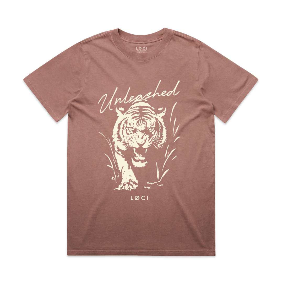 Brown t-shirt with white tiger graphic and 'Unleashed' text on a white background